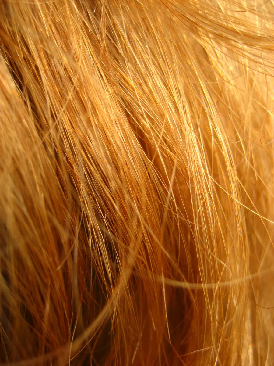 Muestra abstracta de cabello cobrizo